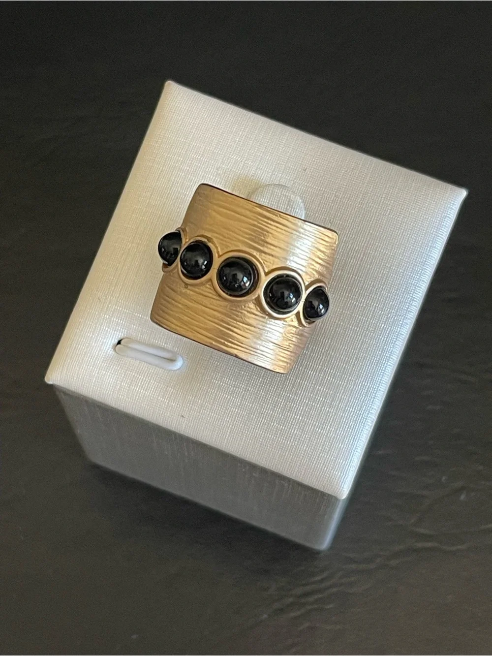 Gold-Tone Wide Band Ring with Black Stone Accents